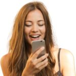 Excited woman on her phone